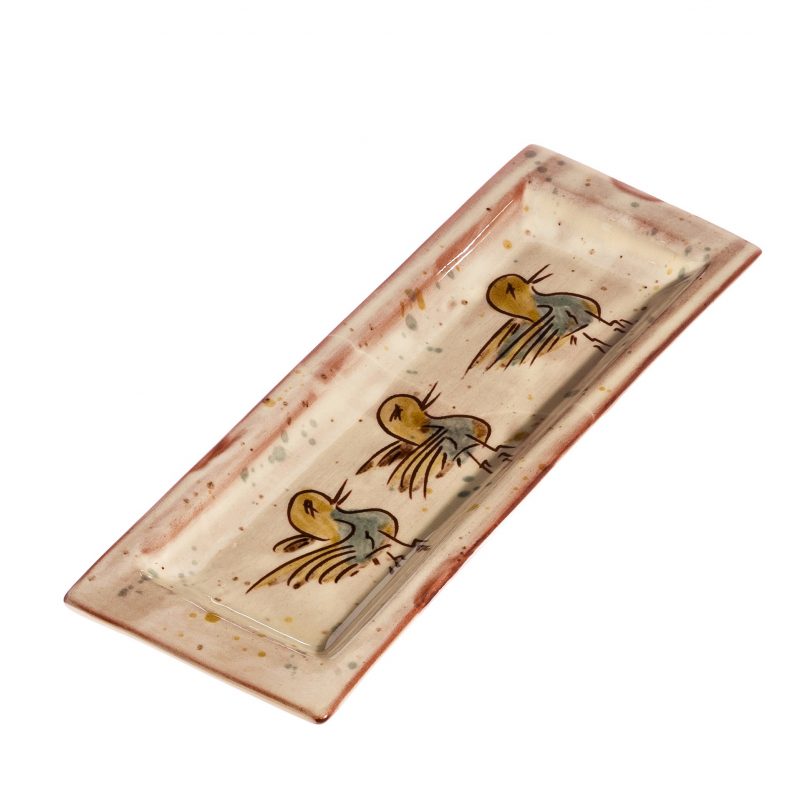 Repose gourmand décoré au clou